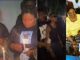 Wizkid and his sisters spotted at the candlelight procession of their mum (Video)